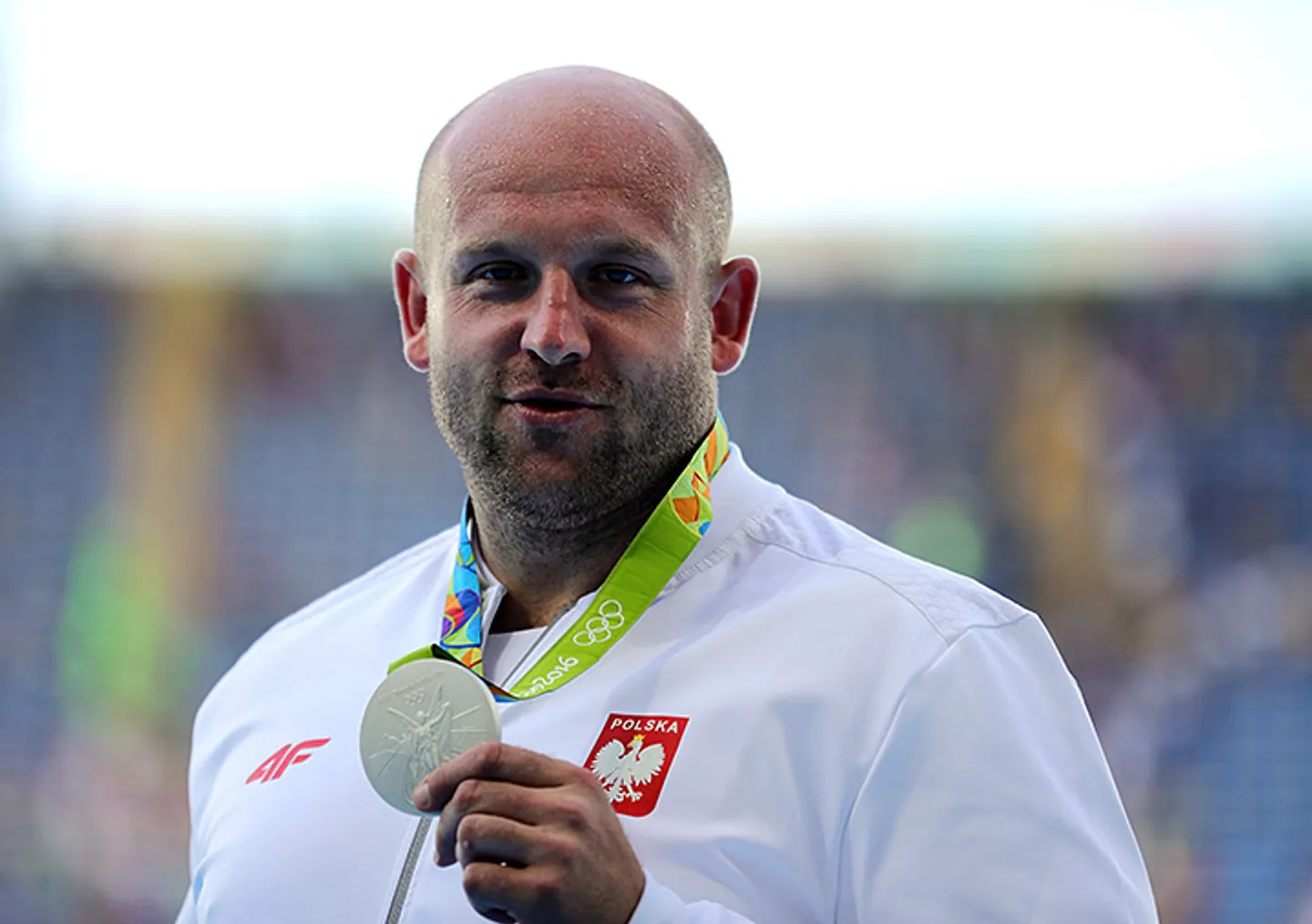 Польский атлет продает медаль ради спасения ребенка